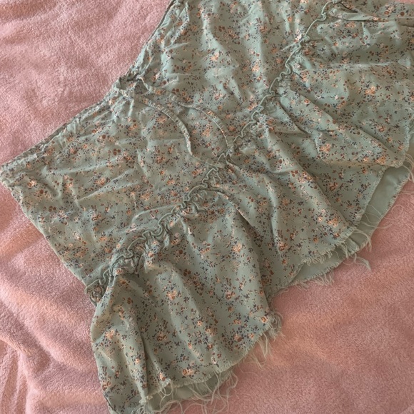 Brandy Melville skirt with tie in front sage green with flowers and purpose rips - Picture 3 of 4
